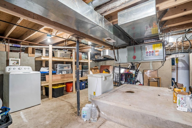 unfinished basement featuring gas water heater and refrigerator