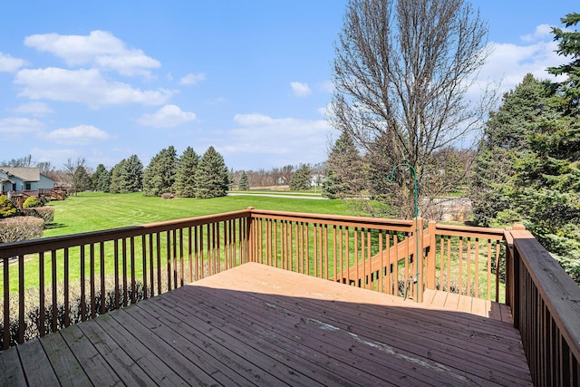 deck featuring a lawn