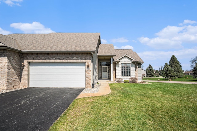 ranch-style house featuring aphalt driveway, a shingled roof, an attached garage, a front yard, and brick siding