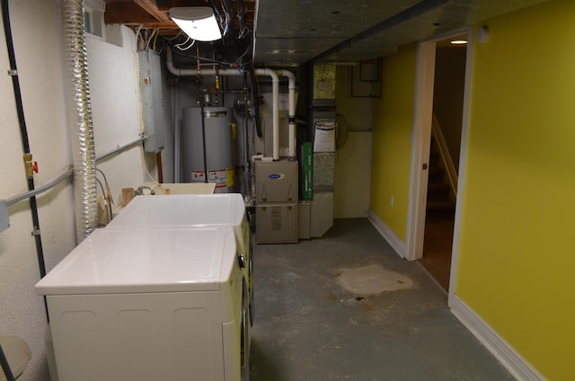3629 Frederick Dr, Ann Arbor, MI 48105 - unfinished basement with gas water heater, washer and clothes dryer, and heating unit