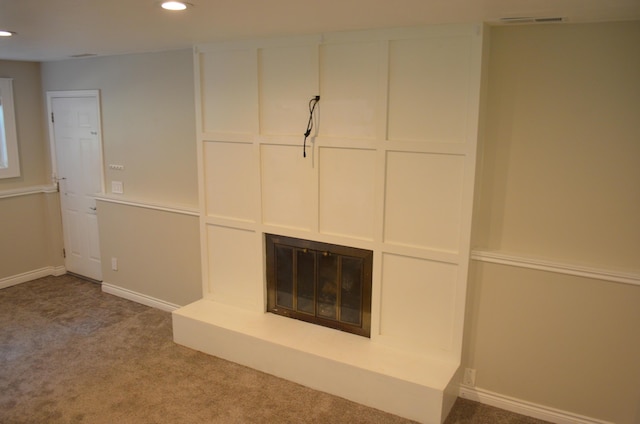 3629 Frederick Dr, Ann Arbor, MI 48105 - detailed view of recessed lighting, carpet floors, and a glass covered fireplace