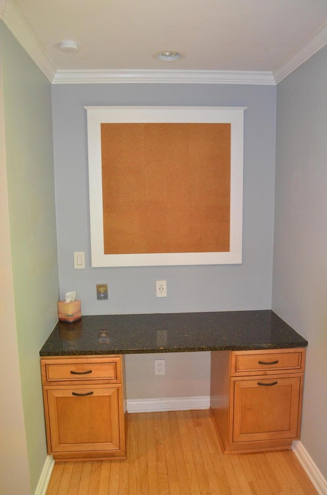 3629 Frederick Dr, Ann Arbor, MI 48105 - detailed view of wood finished floors, built in desk, ornamental molding, and a smoke detector