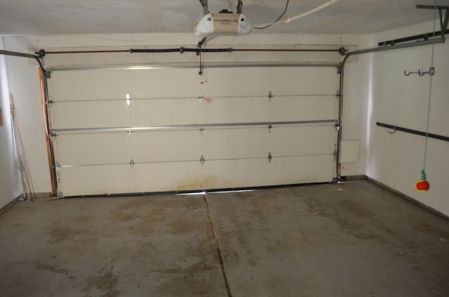 3629 Frederick Dr, Ann Arbor, MI 48105 - garage featuring a garage door opener