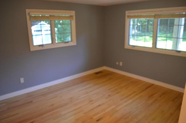 3629 Frederick Dr, Ann Arbor, MI 48105 - spare room featuring baseboards and light wood-type flooring