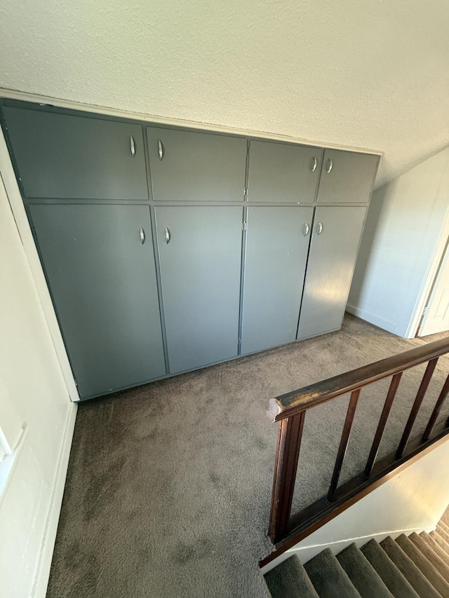 unfurnished bedroom with carpet flooring