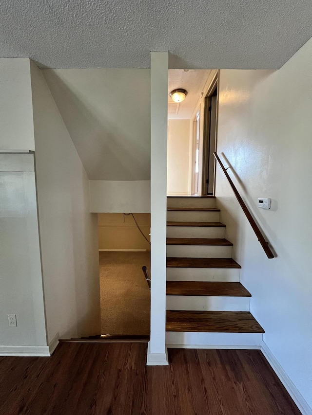 1843 N Sierra Way, Stevensville, MI 49127 - staircase featuring baseboards, wood finished floors, and a textured ceiling