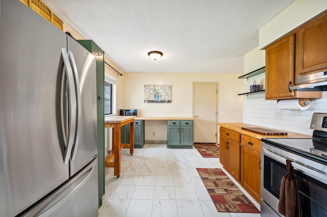1843 N Sierra Way, Stevensville, MI 49127 - kitchen featuring decorative backsplash, marble finish floor, open shelves, under cabinet range hood, and appliances with stainless steel finishes