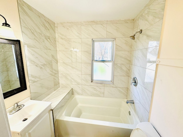 full bathroom featuring toilet, vanity, and shower / tub combination