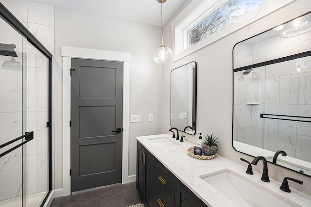 full bath featuring a shower stall, finished concrete floors, a sink, and double vanity