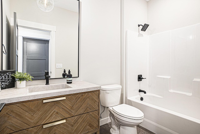bathroom with toilet, vanity, and shower / bathing tub combination