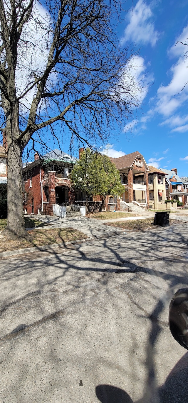 view of front of home featuring brick siding