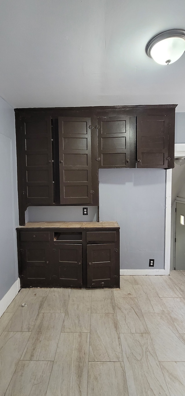 interior space with baseboards