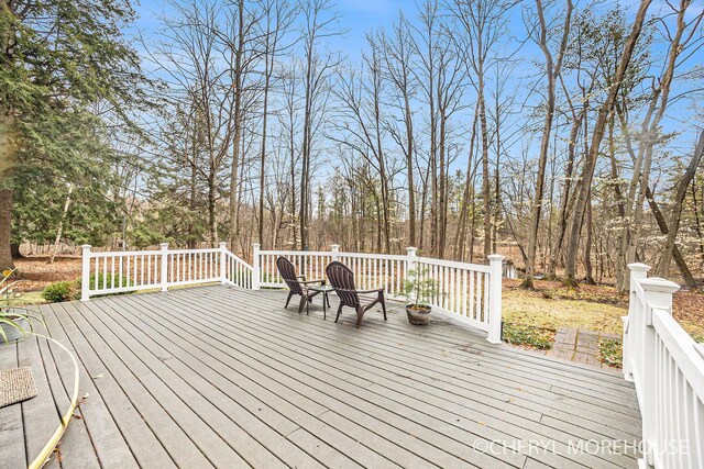 3390 E Baseline Rd, White Cloud, MI 49349 - view of wooden terrace