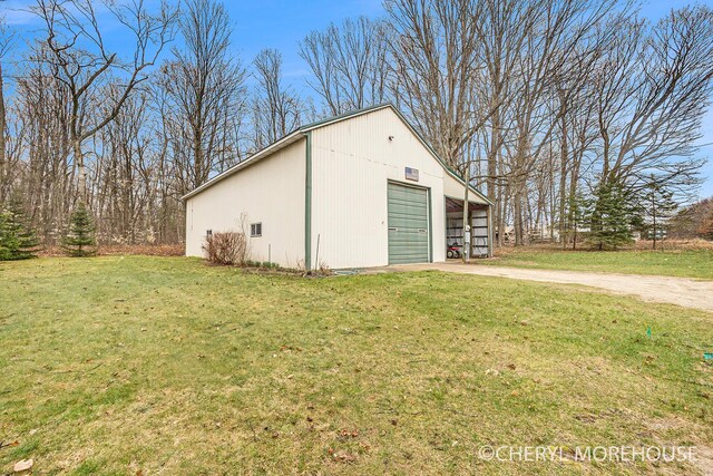 3390 E Baseline Rd, White Cloud, MI 49349 - view of outdoor structure featuring an outdoor structure and concrete driveway