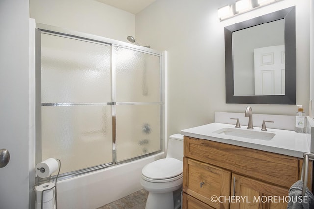 3390 E Baseline Rd, White Cloud, MI 49349 - full bath featuring toilet, vanity, and combined bath / shower with glass door