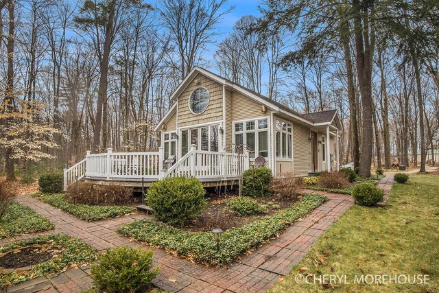 3390 E Baseline Rd, White Cloud, MI 49349 - back of house featuring a deck