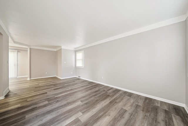 35333 Stellwagen St, Wayne, MI 48184 - unfurnished room featuring baseboards, wood finished floors, and crown molding