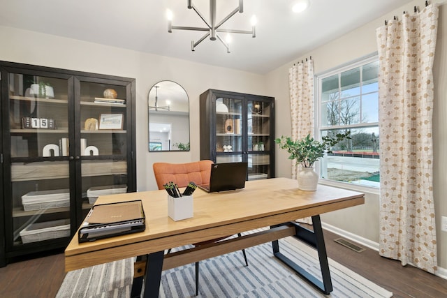 14331 Old Oak Trl, Van Buren, MI 48111 - office featuring visible vents, baseboards, dark wood-type flooring, and an inviting chandelier