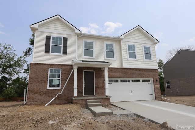 14331 Old Oak Trl, Van Buren, MI 48111 - view of front of home with brick siding, concrete driveway, and a garage