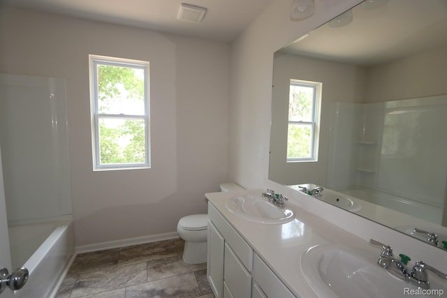 14331 Old Oak Trl, Van Buren, MI 48111 - bathroom featuring plenty of natural light, double vanity, toilet, and shower / washtub combination