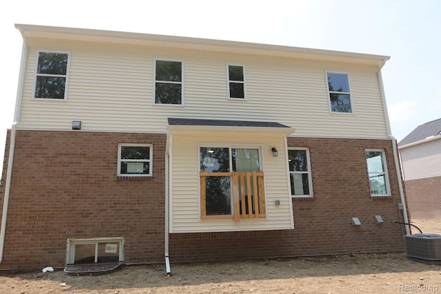 14331 Old Oak Trl, Van Buren, MI 48111 - back of property with brick siding and central AC unit