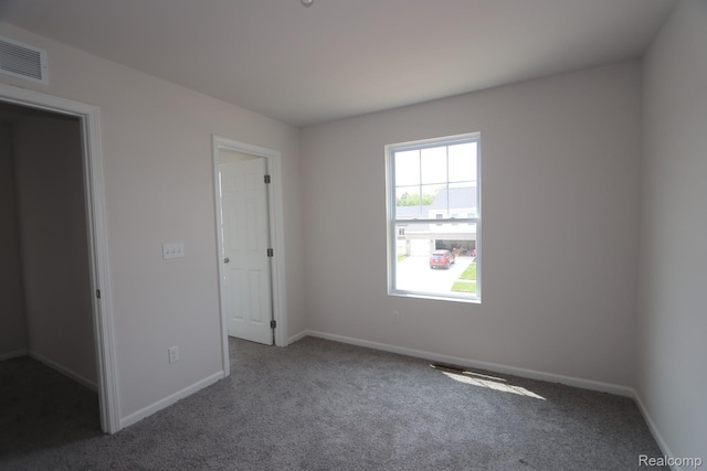 14331 Old Oak Trl, Van Buren, MI 48111 - unfurnished bedroom with carpet floors and baseboards