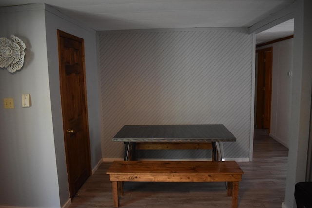 7885 W Fox Rd, Mears, MI 49436 - dining space featuring wood finished floors and baseboards