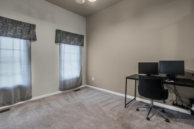 office with baseboards, carpet flooring, and visible vents