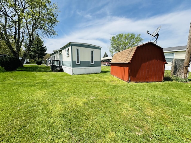 exterior space with a barn and an outbuilding
