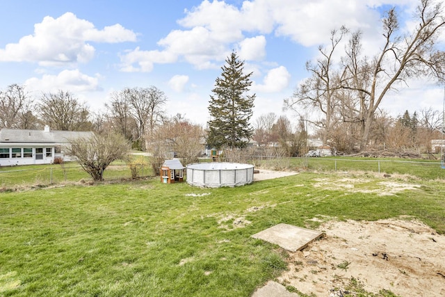 808 Longfellow Ave, Jackson, MI 49202 - view of yard featuring fence and an outdoor pool