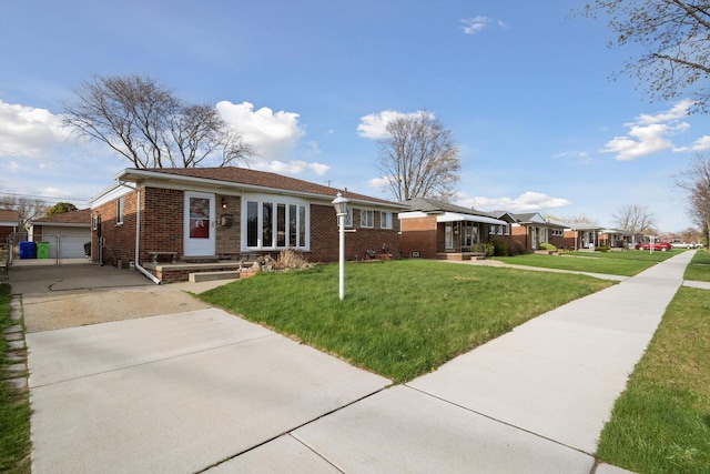 view of front facade with a front lawn and brick siding