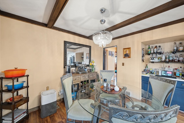 dining space featuring beamed ceiling, wood finished floors, baseboards, and an inviting chandelier
