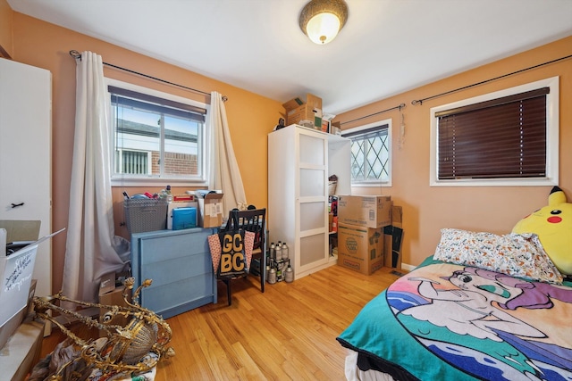 bedroom featuring wood finished floors
