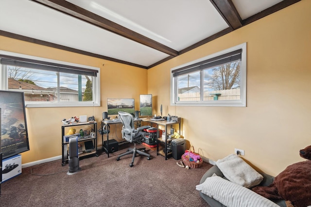 office featuring carpet floors and vaulted ceiling with beams