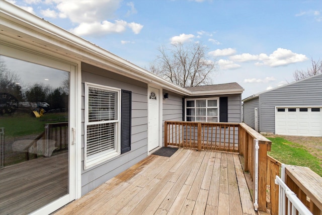 wooden deck featuring a garage