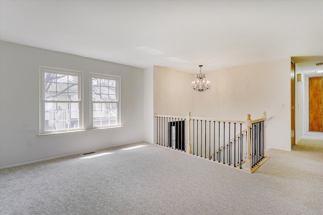 2919 Roundtree Dr, Troy, MI 48083 - unfurnished room with carpet floors and a chandelier