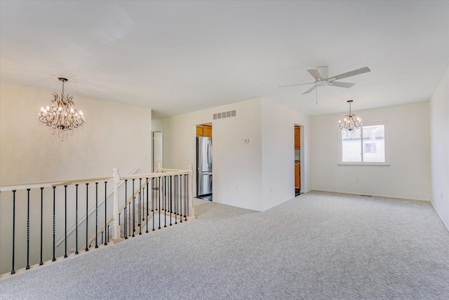 2919 Roundtree Dr, Troy, MI 48083 - unfurnished room featuring a chandelier and light carpet