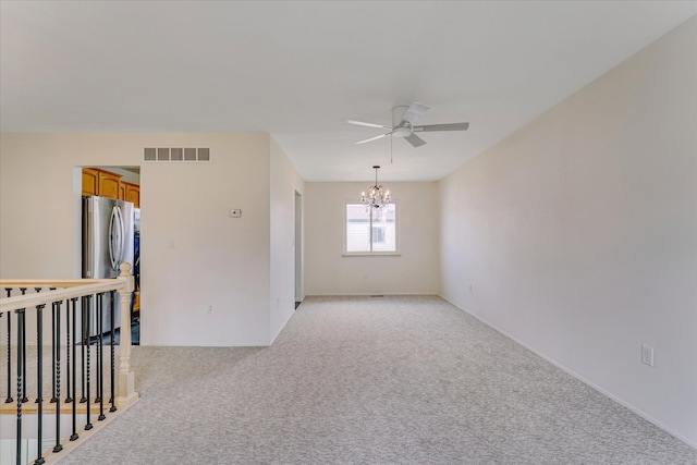 2919 Roundtree Dr, Troy, MI 48083 - empty room with a chandelier, light carpet, and ceiling fan