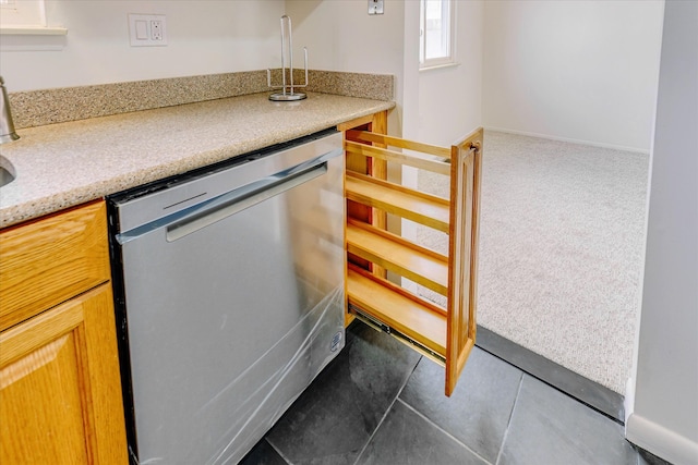 2919 Roundtree Dr, Troy, MI 48083 - kitchen with stainless steel dishwasher and light countertops