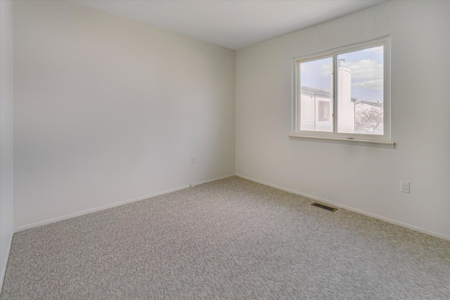 2919 Roundtree Dr, Troy, MI 48083 - empty room featuring carpet and baseboards