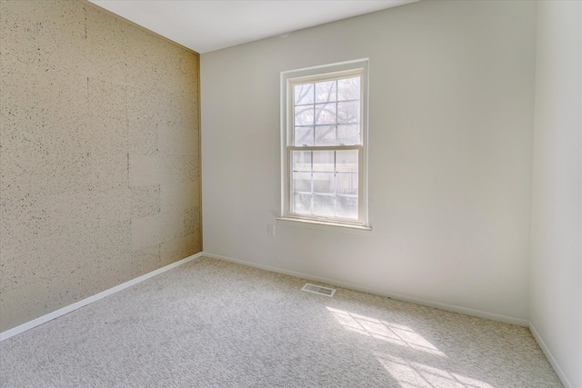 2919 Roundtree Dr, Troy, MI 48083 - carpeted spare room with baseboards