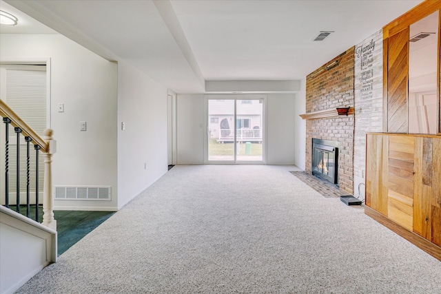 2919 Roundtree Dr, Troy, MI 48083 - unfurnished living room with carpet flooring, stairway, a fireplace, and baseboards
