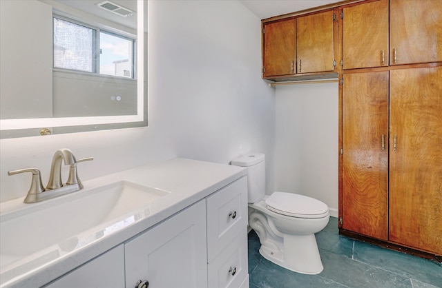 2919 Roundtree Dr, Troy, MI 48083 - bathroom featuring vanity and toilet
