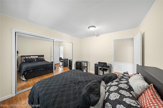 21700 W 13 Mile Rd, Beverly Hills, MI 48025 - bedroom featuring ornamental molding, wood finished floors, and a closet