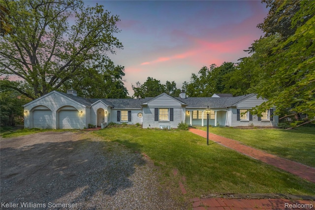 21700 W 13 Mile Rd, Beverly Hills, MI 48025 - ranch-style home featuring a chimney, dirt driveway, a garage, and a lawn