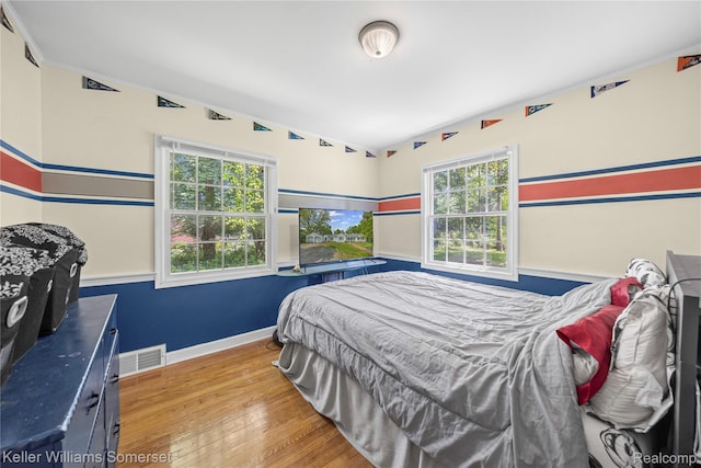 21700 W 13 Mile Rd, Beverly Hills, MI 48025 - bedroom featuring wood finished floors and baseboards