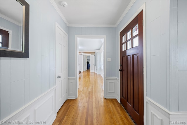 21700 W 13 Mile Rd, Beverly Hills, MI 48025 - foyer entrance with a decorative wall, light wood-style floors, and ornamental molding