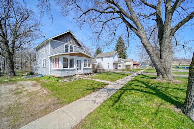 124 Broad St, Brooklyn, MI 49230 - exterior space with a front lawn and entry steps