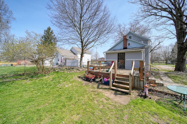 124 Broad St, Brooklyn, MI 49230 - view of yard featuring fence and a wooden deck