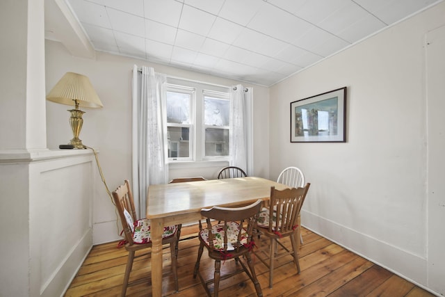 124 Broad St, Brooklyn, MI 49230 - dining space with hardwood / wood-style flooring and baseboards